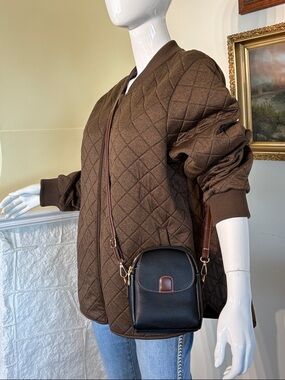 NWOT Chic Black Faux Leather Mini Crossbody Bag | Brown Trim | Gold Hardware